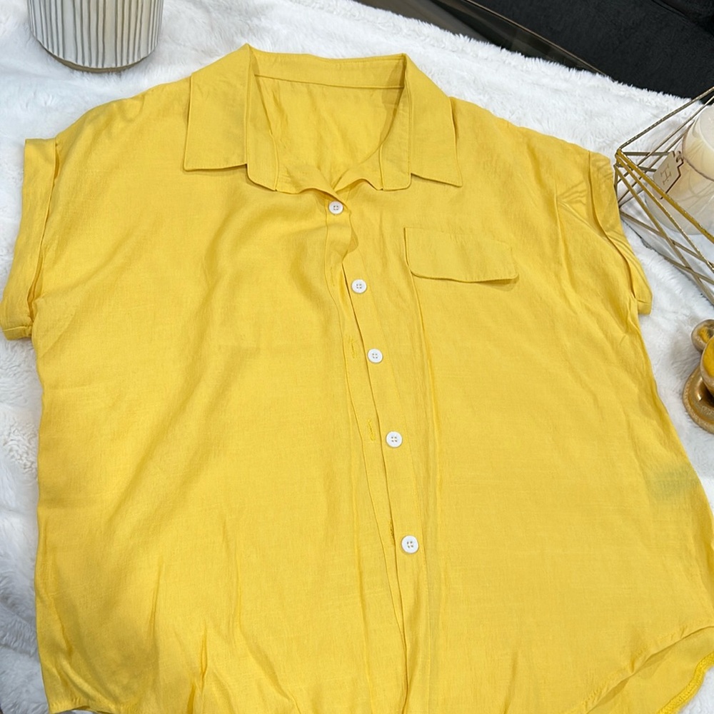 Yellow button down blouse